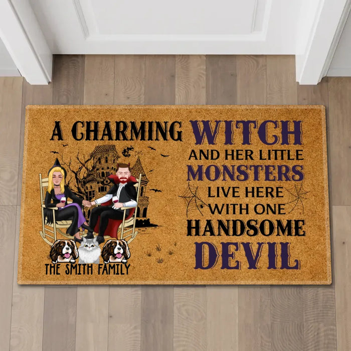 A Charming Witch and Her Little Monsters Live Here with One Handsome Devil - Personalized Gifts Custom Halloween Doormat for Fur Family, Dog Cat Lovers