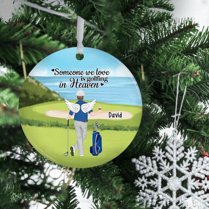 Someone We Love Is Golfing In Heaven - Personalized Golfer Memorial Ornament, Memorial Golf Gift