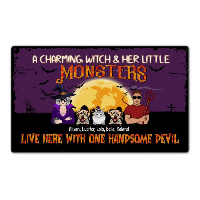 A Charming Witch Her Little Monsters Live Here With One Handsome Devil - Personalized Gifts Custom Halloween Doormat For Couples, Dog Cat Lovers