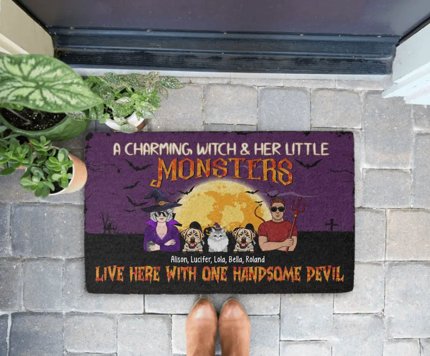 A Charming Witch Her Little Monsters Live Here With One Handsome Devil - Personalized Gifts Custom Halloween Doormat For Couples, Dog Cat Lovers